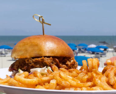 Bachelorette group sharing tacos and drinks at a Folly Beach patio