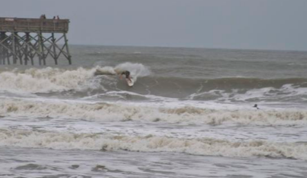 Bachelorette group taking a beginner surf lesson on Folly Beach