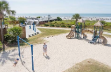 Bachelorette group setting up on the sand at Isle of Palms County Park